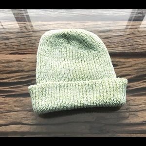 Winter hat. Light sage green color. Knitted hat.